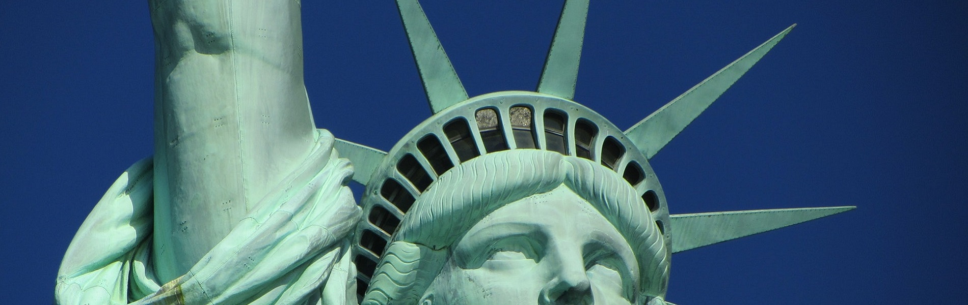 Statue of Liberty against a beautiful blue sky